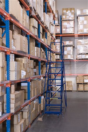 simsearch:693-03315346,k - Cardboard boxes on shelves in distribution warehouse Stock Photo - Premium Royalty-Free, Code: 693-03315344