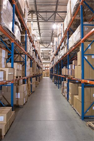 simsearch:693-03315346,k - Cardboard boxes on shelves in distribution warehouse Stock Photo - Premium Royalty-Free, Code: 693-03315347