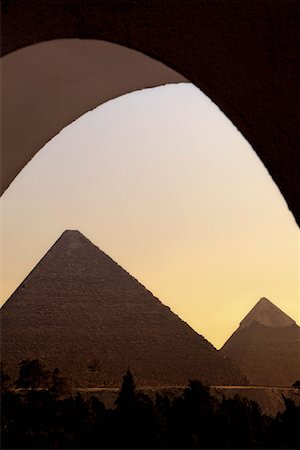 egipto - The Great Pyramids at sunset Foto de stock - Sin royalties Premium, Código: 693-03316469