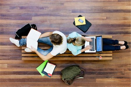 student with computer in campus - University students studying, from above Stock Photo - Premium Royalty-Free, Code: 693-03317295