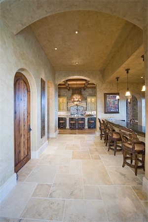 flooring perspective - Tiled floor of palm Spring kitchen with arched ceiling Stock Photo - Premium Royalty-Free, Code: 693-03317417