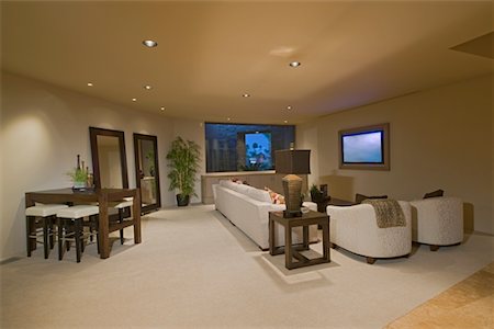 simsearch:693-03317418,k - White entertainment suite in Palm Springs home Stock Photo - Premium Royalty-Free, Code: 693-03317441