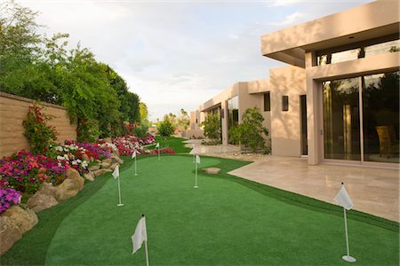 Mini golf course in Palm Springs garden Stock Photo - Premium Royalty-Free, Code: 693-03317480