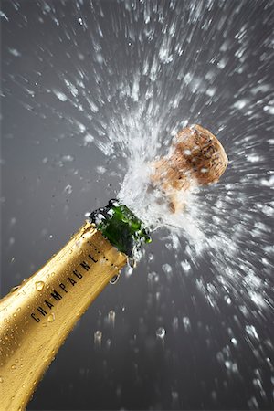 popping - Champagne bottle popping cork, close-up Foto de stock - Sin royalties Premium, Código: 693-03311150