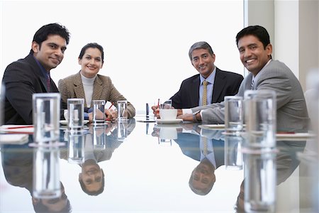 Portrait of business associates during meeting Stock Photo - Premium Royalty-Free, Code: 693-03311499