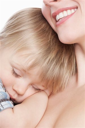 shoulders mom - Mère fils endormi câlins (1 - 2), gros plan Photographie de stock - Premium Libres de Droits, Code: 693-03312612