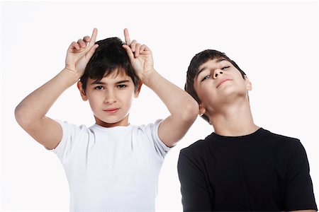 Twin boys (13-15), portrait Stock Photo - Premium Royalty-Free, Code: 693-03312728