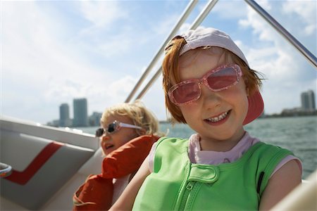 Girl (7-9) on yacht Stock Photo - Premium Royalty-Free, Code: 693-03312720