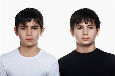 sibling portrait two people serious - Twin boys (13-15) portrait Stock Photo - Premium Royalty-Free, Code: 693-03312723