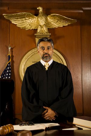 simsearch:693-03312783,k - Middle-aged judge standing in a courtroom Stock Photo - Premium Royalty-Free, Code: 693-03312786