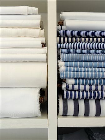 Two piles of cotton towels on shelf Stock Photo - Premium Royalty-Free, Code: 693-03312791