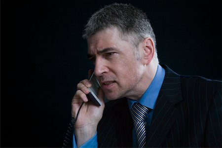 simsearch:693-03314173,k - Worried Businessman on the Telephone Stock Photo - Premium Royalty-Free, Code: 693-03313287
