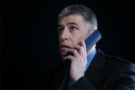 simsearch:693-03314173,k - Worried Businessman on the Telephone Stock Photo - Premium Royalty-Free, Code: 693-03313288