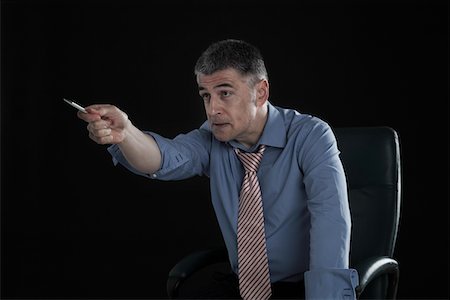 simsearch:693-03314173,k - Angry Businessman Pointing a Pen Stock Photo - Premium Royalty-Free, Code: 693-03313280