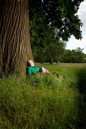 simsearch:693-03313408,k - Woman Sitting Beneath a Tree Stock Photo - Premium Royalty-Free, Code: 693-03313357