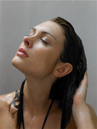 Woman Showering Stock Photo - Premium Royalty-Free, Code: 693-03313470