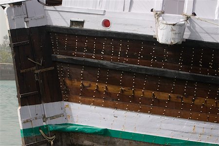 dubai creek - Dubaï, Émirats Arabes Unis, les Dhows, vieux voiliers en bois, sont amarrés le long du côté de Deira de Dubaï Creek. Photographie de stock - Premium Libres de Droits, Code: 693-03313636