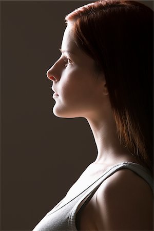 estirar - Portrait de jeune femme côté vue Photographie de stock - Premium Libres de Droits, Code: 693-03440805