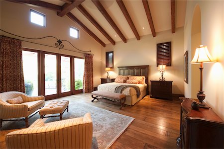 spacious - Spacious high beamed bedroom Stock Photo - Premium Royalty-Free, Code: 693-03474118