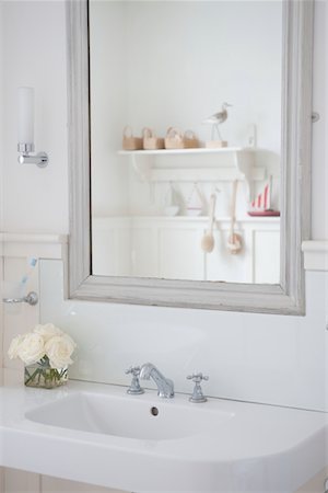 shelf home not people - Grey painted mirror surround above washbasin, London Stock Photo - Premium Royalty-Free, Code: 693-03474271