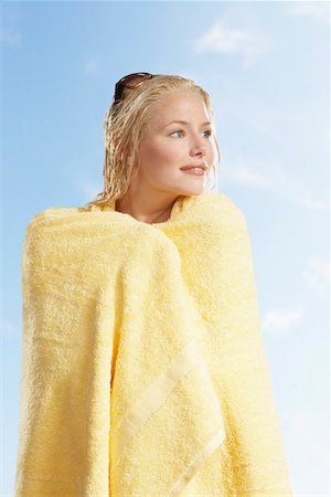 Woman Wrapped in Towel on a sunny day Stock Photo - Premium Royalty-Free, Code: 693-03557565