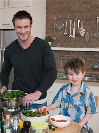 pictures of kids helping parents with dishes - Father and Son Preparing Salad Stock Photo - Premium Royalty-Free, Code: 693-03564378
