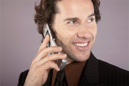 simsearch:693-03564532,k - Businessman Using Cell Phone Stock Photo - Premium Royalty-Free, Code: 693-03564535
