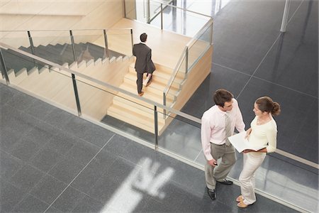 stair from above - Businessman and Businesswoman on Office Balcony Stock Photo - Premium Royalty-Free, Code: 693-03564673