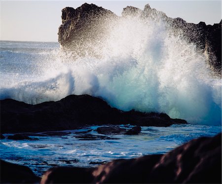 Waves crashing on rocks at coast Stock Photo - Premium Royalty-Free, Code: 693-03565157