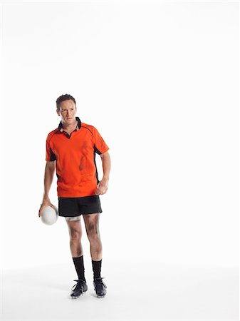 simsearch:693-03565397,k - Rugby player standing holding ball Stock Photo - Premium Royalty-Free, Code: 693-03565407