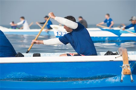 Outrigger canoeing teams compete Foto de stock - Sin royalties Premium, Código: 693-03617048