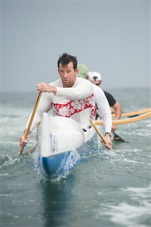 simsearch:693-03617070,k - Outrigger canoeing team on water Stock Photo - Premium Royalty-Free, Code: 693-03617078