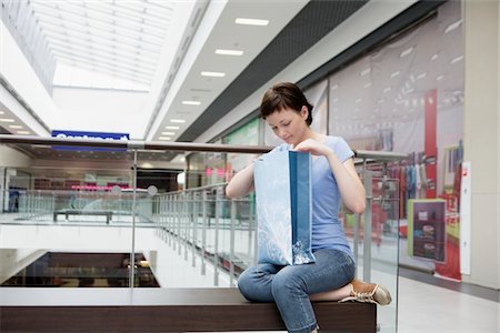 russian - Young woman sits in new Voronezh shopping centre Stock Photo - Premium Royalty-Free, Code: 693-03643998