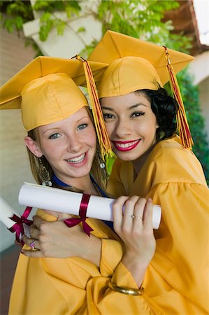 simsearch:693-06014222,k - Two graduates hugging outside, portrait Stock Photo - Premium Royalty-Free, Code: 693-03686371