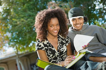 Friends studying outdoors, (portrait) Stock Photo - Premium Royalty-Free, Code: 693-03686444