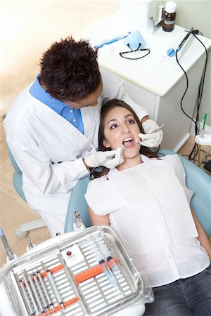 simsearch:693-06014951,k - Dentist examining patient in surgery Stock Photo - Premium Royalty-Free, Code: 693-03686458