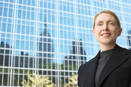 simsearch:693-03564532,k - Businesswoman outside office building, portrait Stock Photo - Premium Royalty-Free, Code: 693-03686659