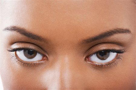 Jeune noire les yeux femme Photographie de stock - Premium Libres de Droits, Code: 693-03686706