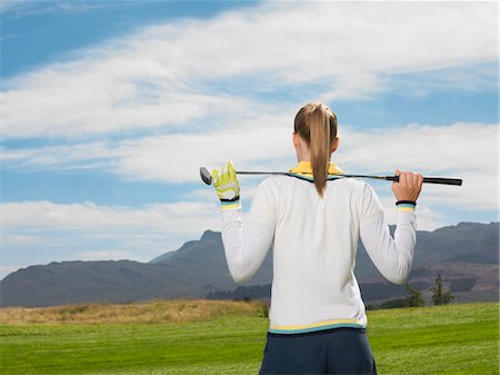 simsearch:693-03304456,k - Young woman on golf course, back view Foto de stock - Sin royalties Premium, Código: 693-03686736