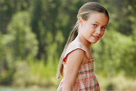 Girl (7-9) standing outdoors, portrait. Stock Photo - Premium Royalty-Free, Code: 693-03686767