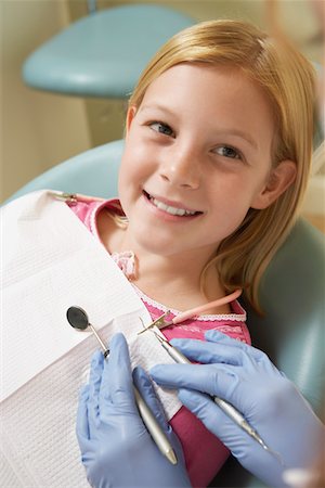 Girl (7-10) at dentists, (close-up) Stock Photo - Premium Royalty-Free, Code: 693-03707064