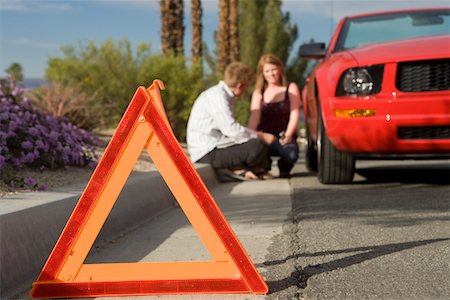 Couple Having Car Trouble Stock Photo - Premium Royalty-Free, Code: 693-03707123