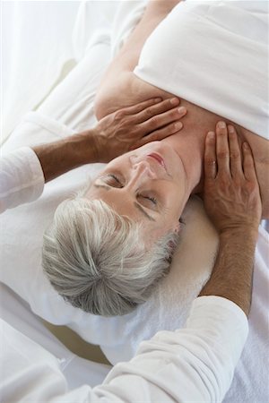 simsearch:851-02963682,k - Senior woman having massage Stock Photo - Premium Royalty-Free, Code: 693-03707165