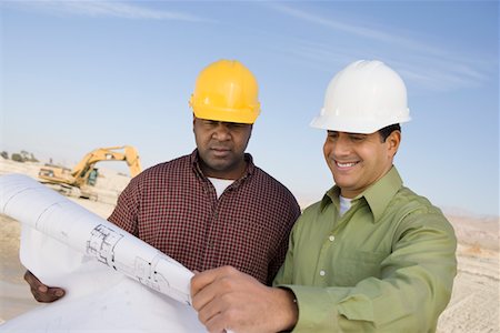 simsearch:693-06016692,k - Two construction workers studying blueprint Stock Photo - Premium Royalty-Free, Code: 693-03707178