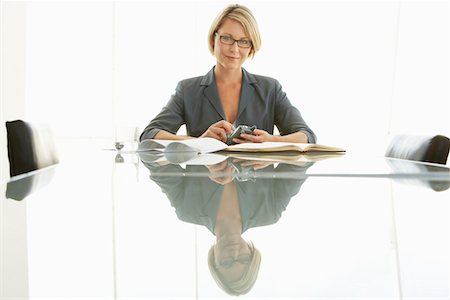 simsearch:693-03564532,k - Businesswoman at conference table, portrait Stock Photo - Premium Royalty-Free, Code: 693-03707310