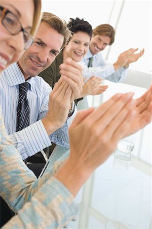 simsearch:693-03707355,k - Business colleagues applauding in conference meeting Stock Photo - Premium Royalty-Free, Code: 693-03707336