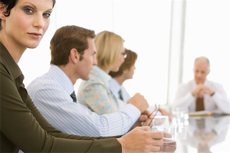simsearch:693-03707355,k - Business woman with colleagues in conference meeting Stock Photo - Premium Royalty-Free, Code: 693-03707332