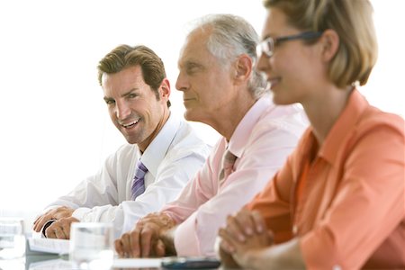 simsearch:693-03707355,k - Business colleagues in conference meeting Stock Photo - Premium Royalty-Free, Code: 693-03707355