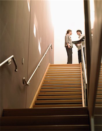 Businesspeople at Top of Stairs Stock Photo - Premium Royalty-Free, Code: 693-03707506