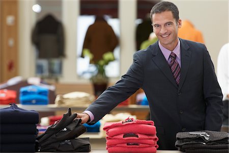 simsearch:693-06018818,k - Businessman in Clothing Store Fotografie stock - Premium Royalty-Free, Codice: 693-03707606